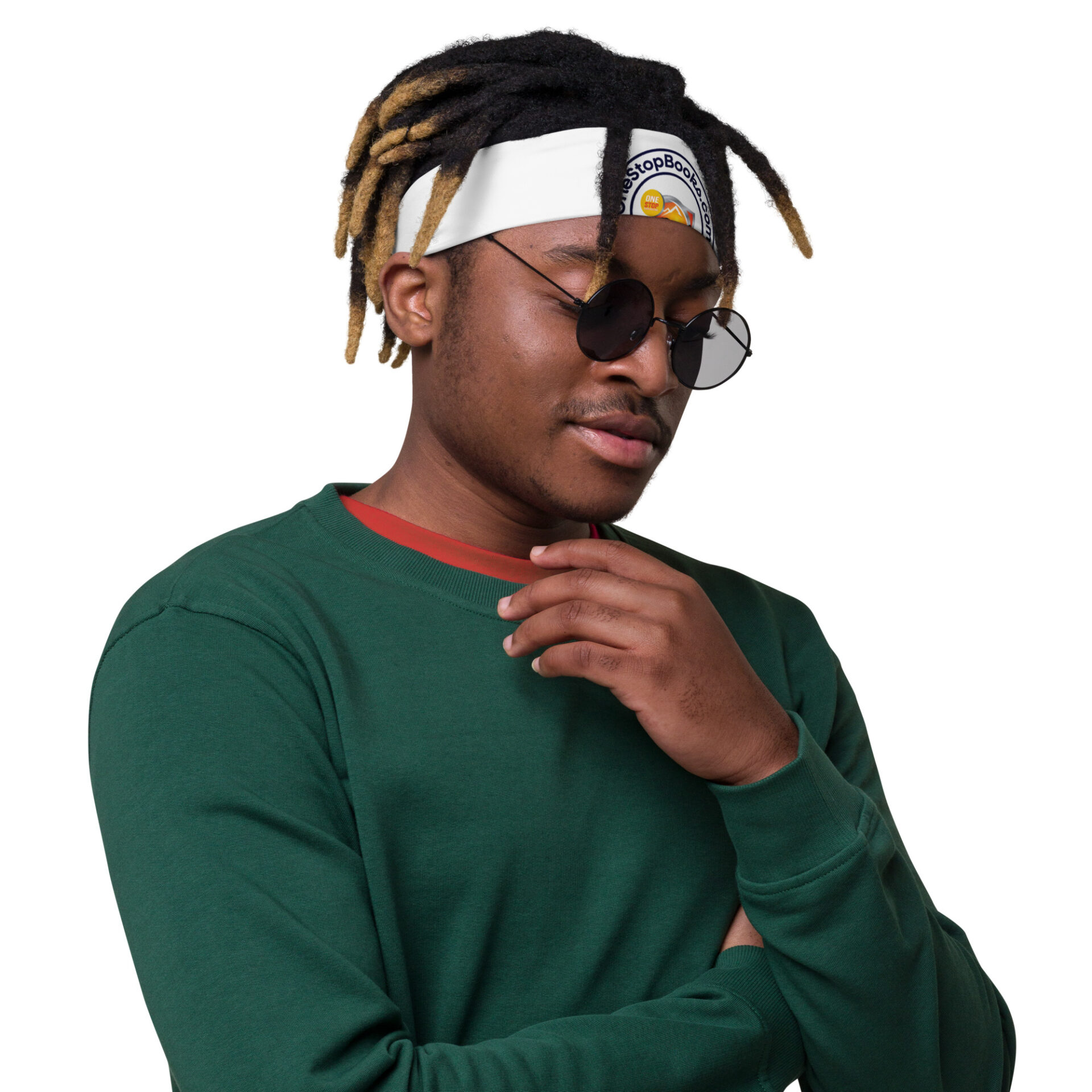Man with dreadlocks wearing green sweater and sunglasses.