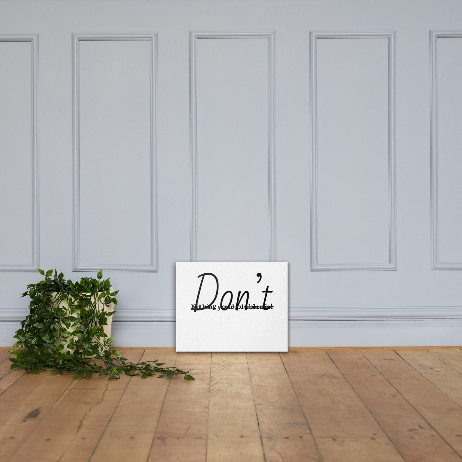 "Don't" quote on white canvas print.