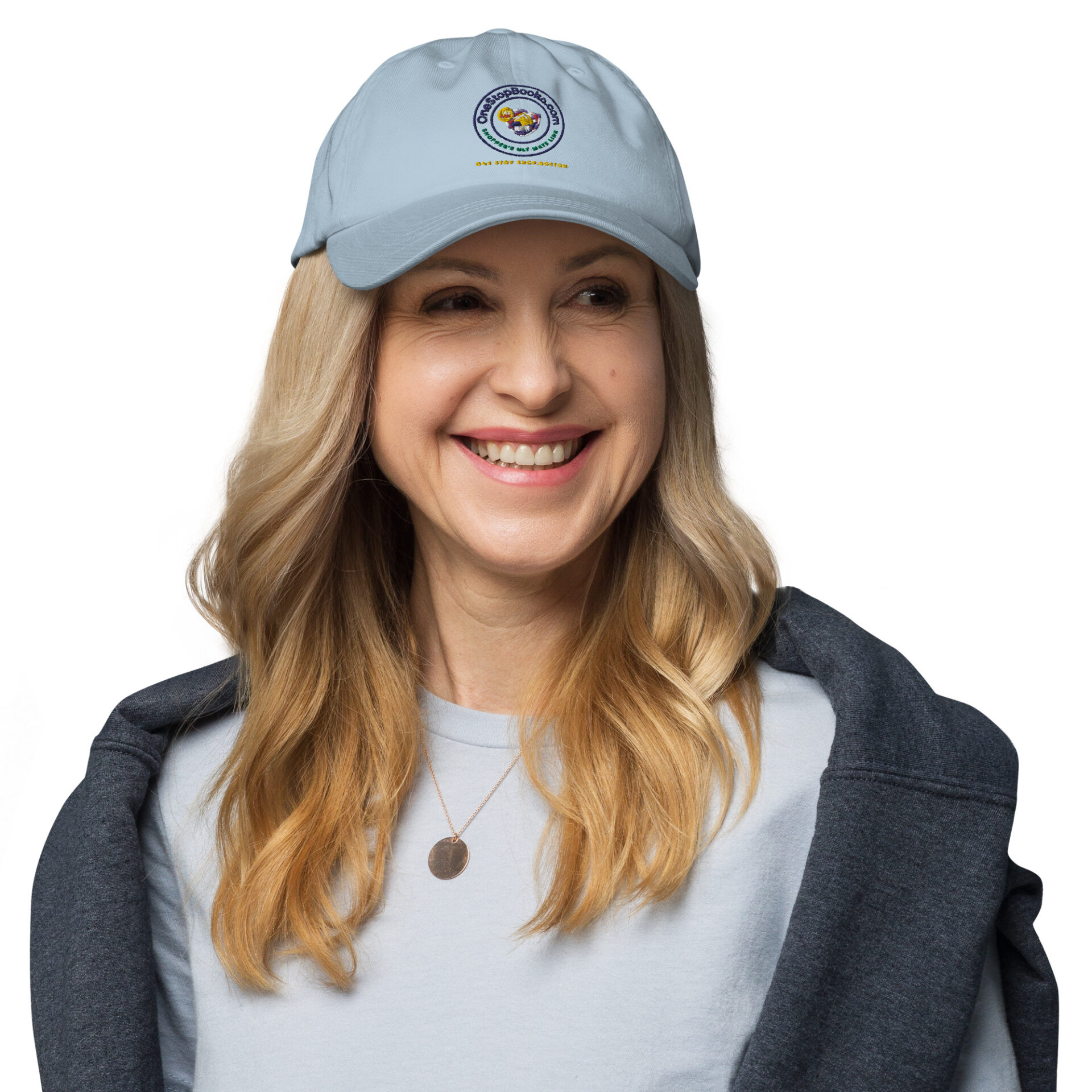 Smiling woman wearing a blue cap.