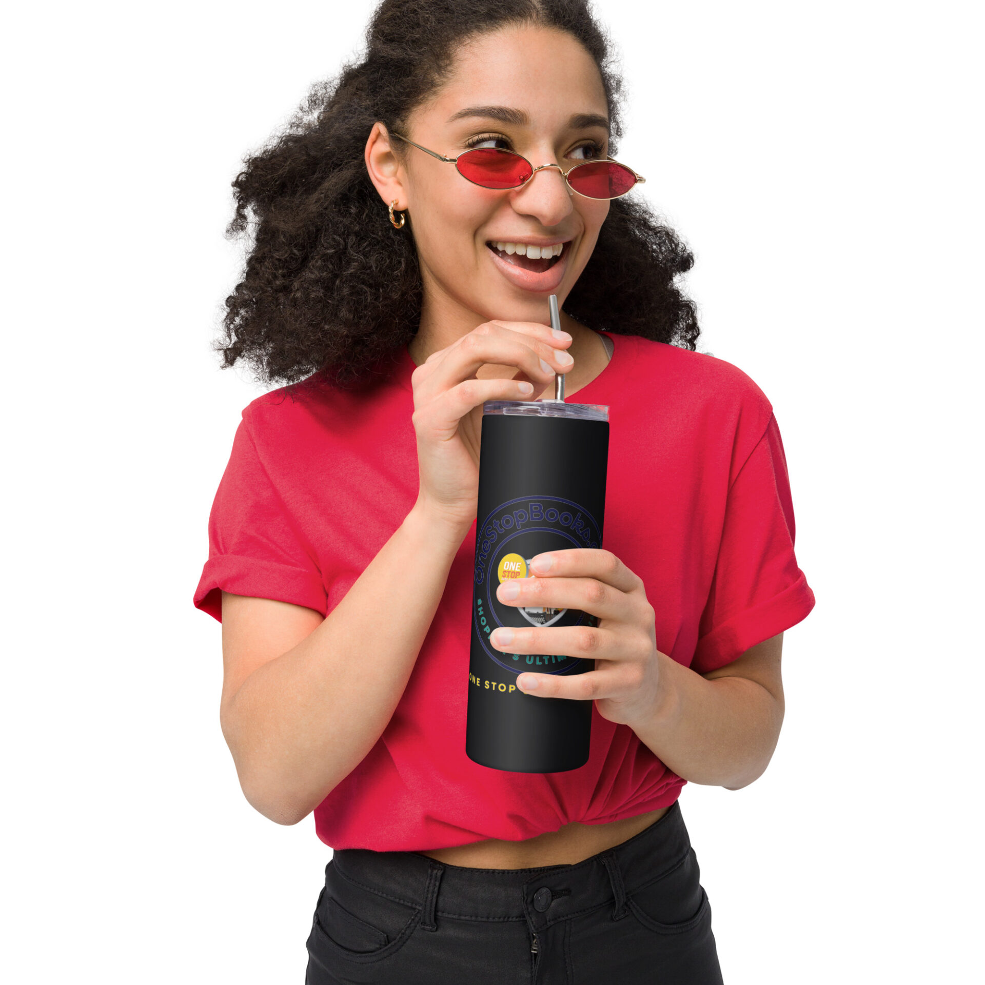 Woman in red shirt holding a black tumbler.