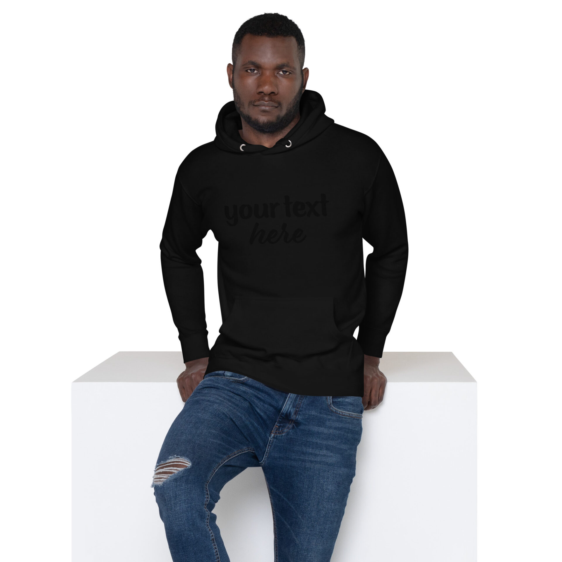 Man in black hoodie with text on chest.