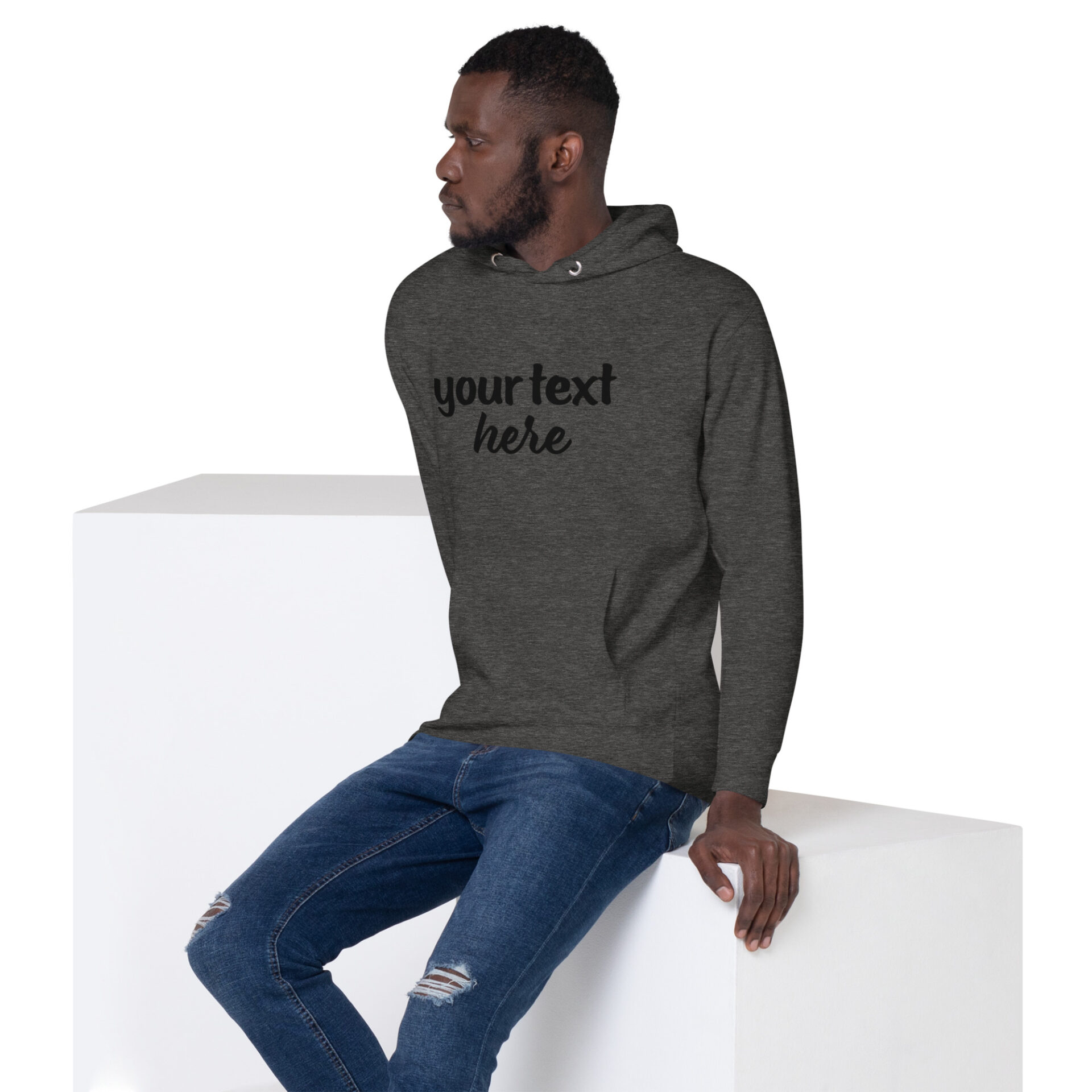 Man wearing a grey hoodie with text.