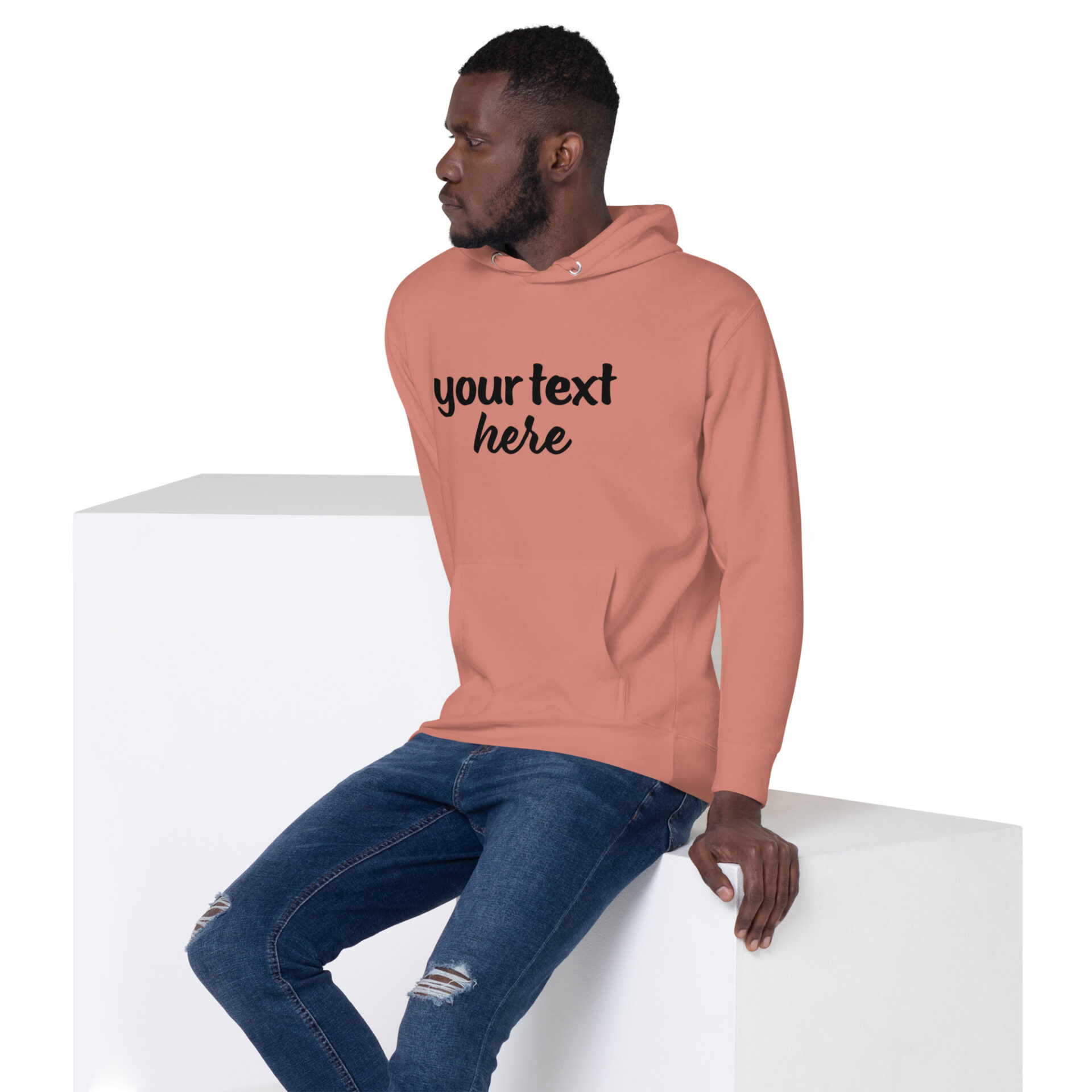 Man wearing a salmon hoodie with text.