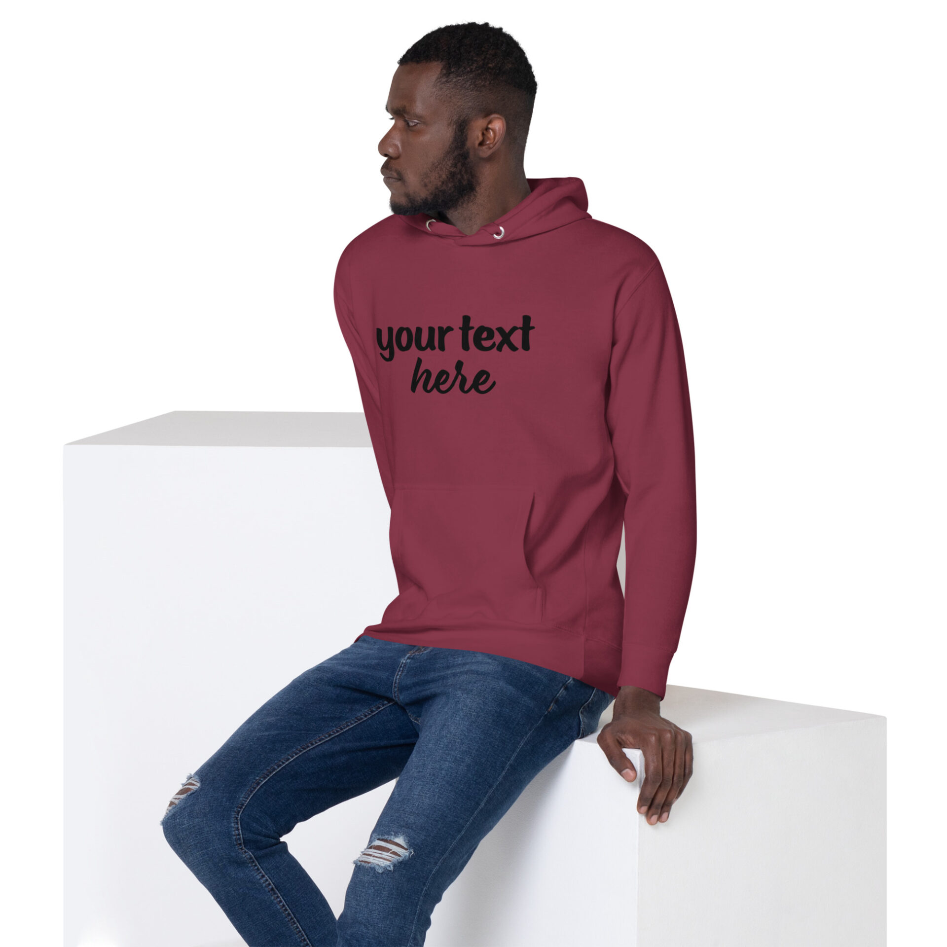 Man wearing a red hoodie with text.