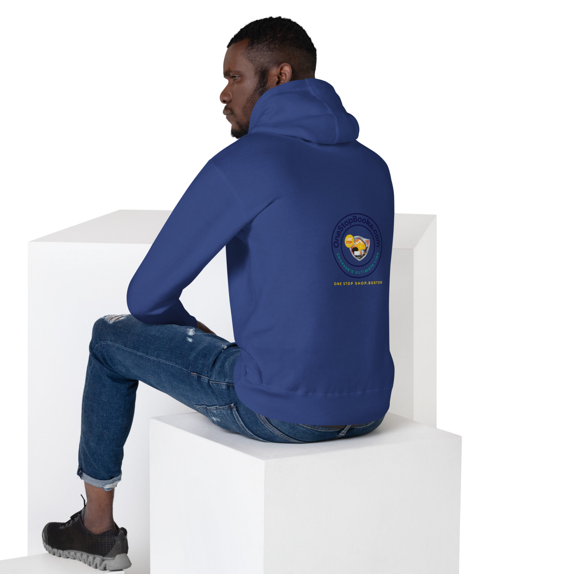 Man wearing a blue hoodie with logo.