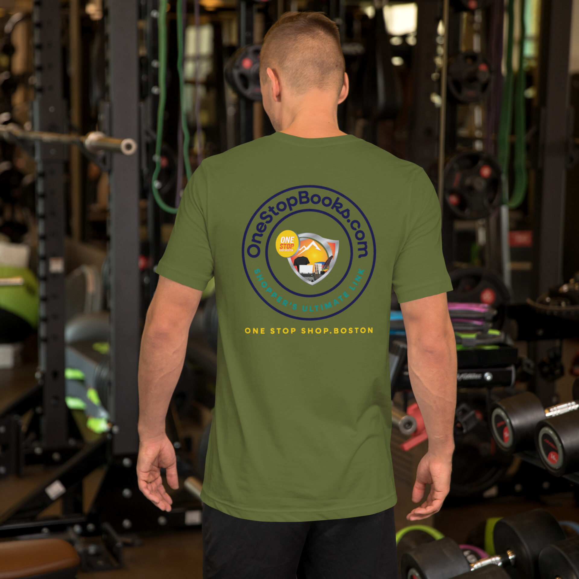 Man wearing green t-shirt with logo.