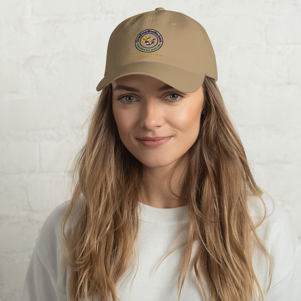Woman wearing a tan baseball cap.