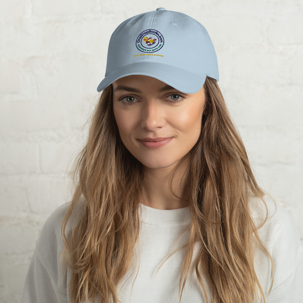 Woman wearing a blue baseball cap.