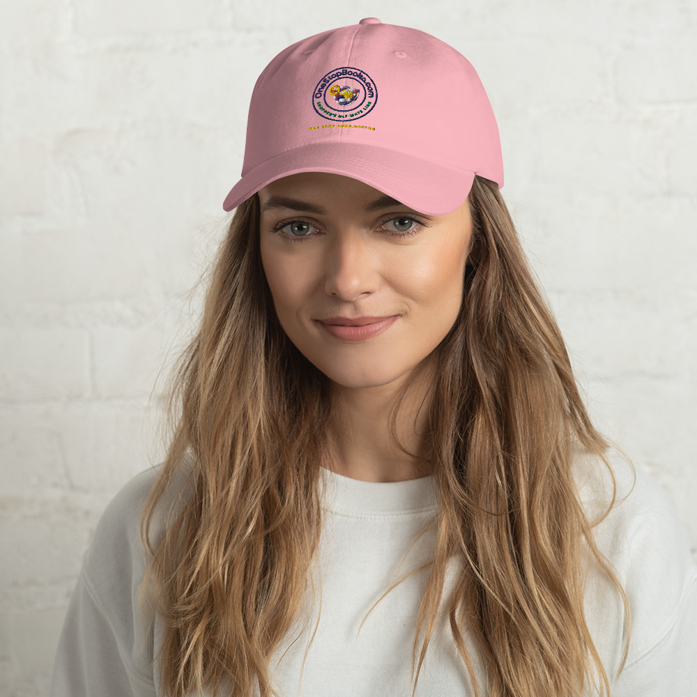 Woman wearing a pink baseball cap.