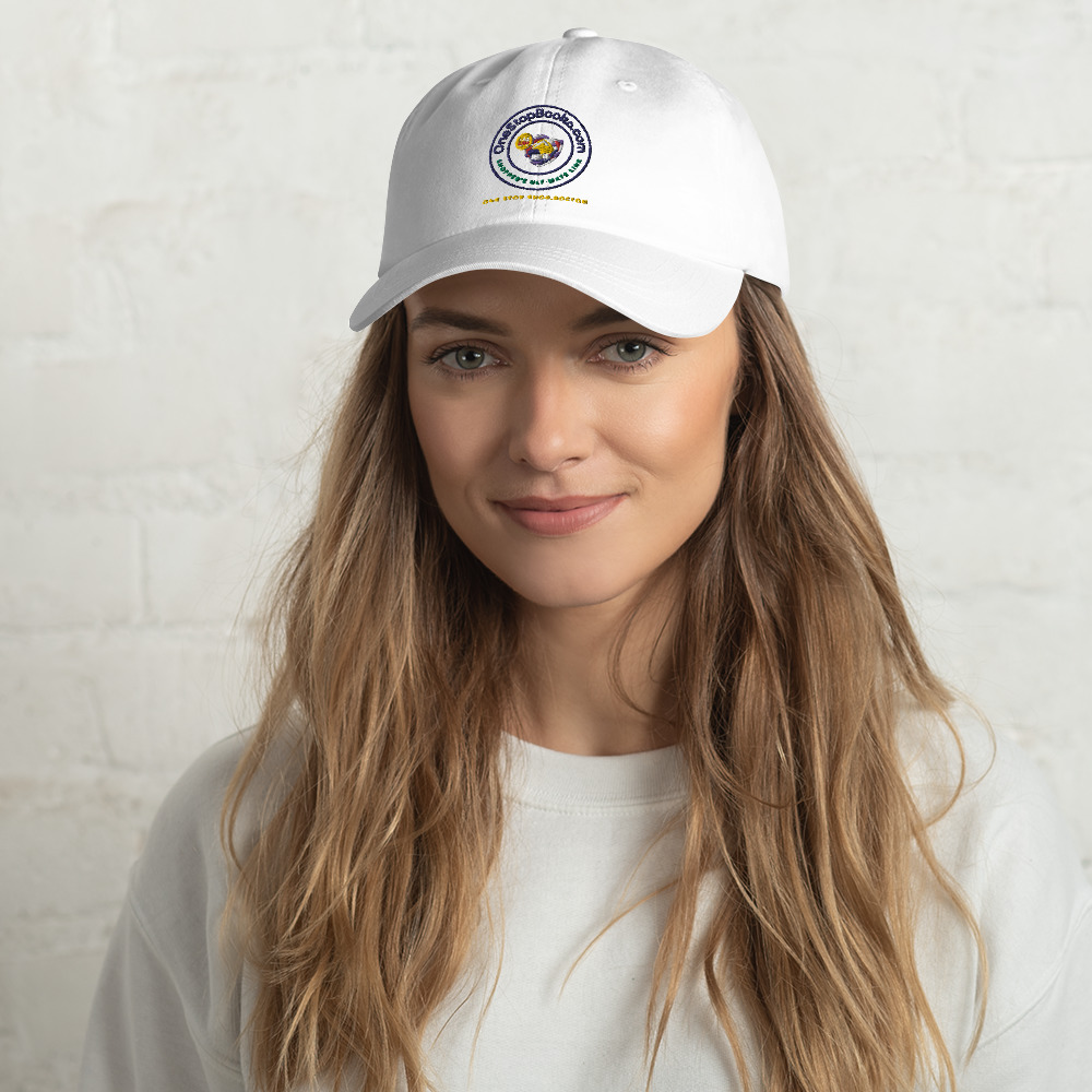 Woman wearing a white cap with a logo.