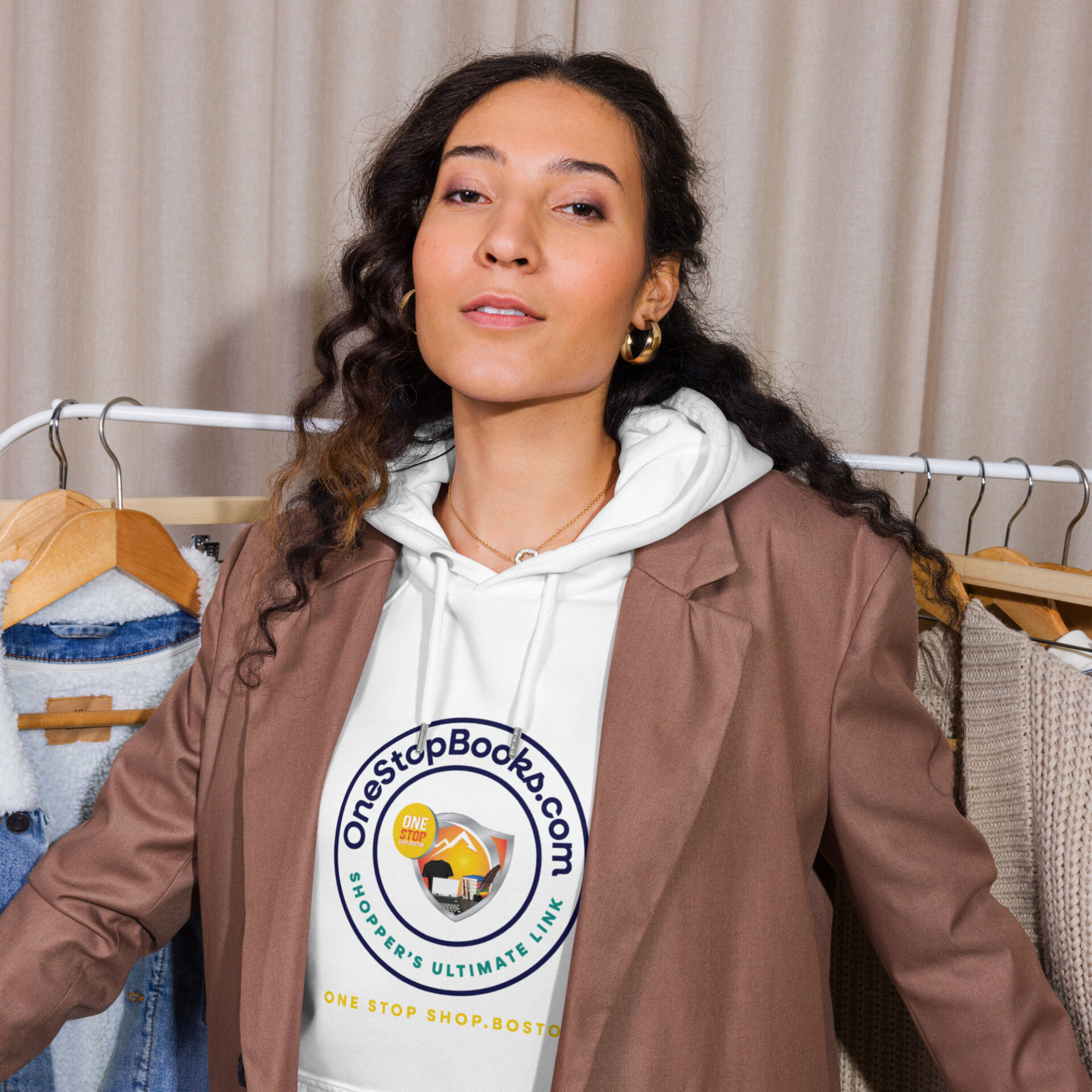 Woman wearing a "OneStopBooks.com" hoodie.